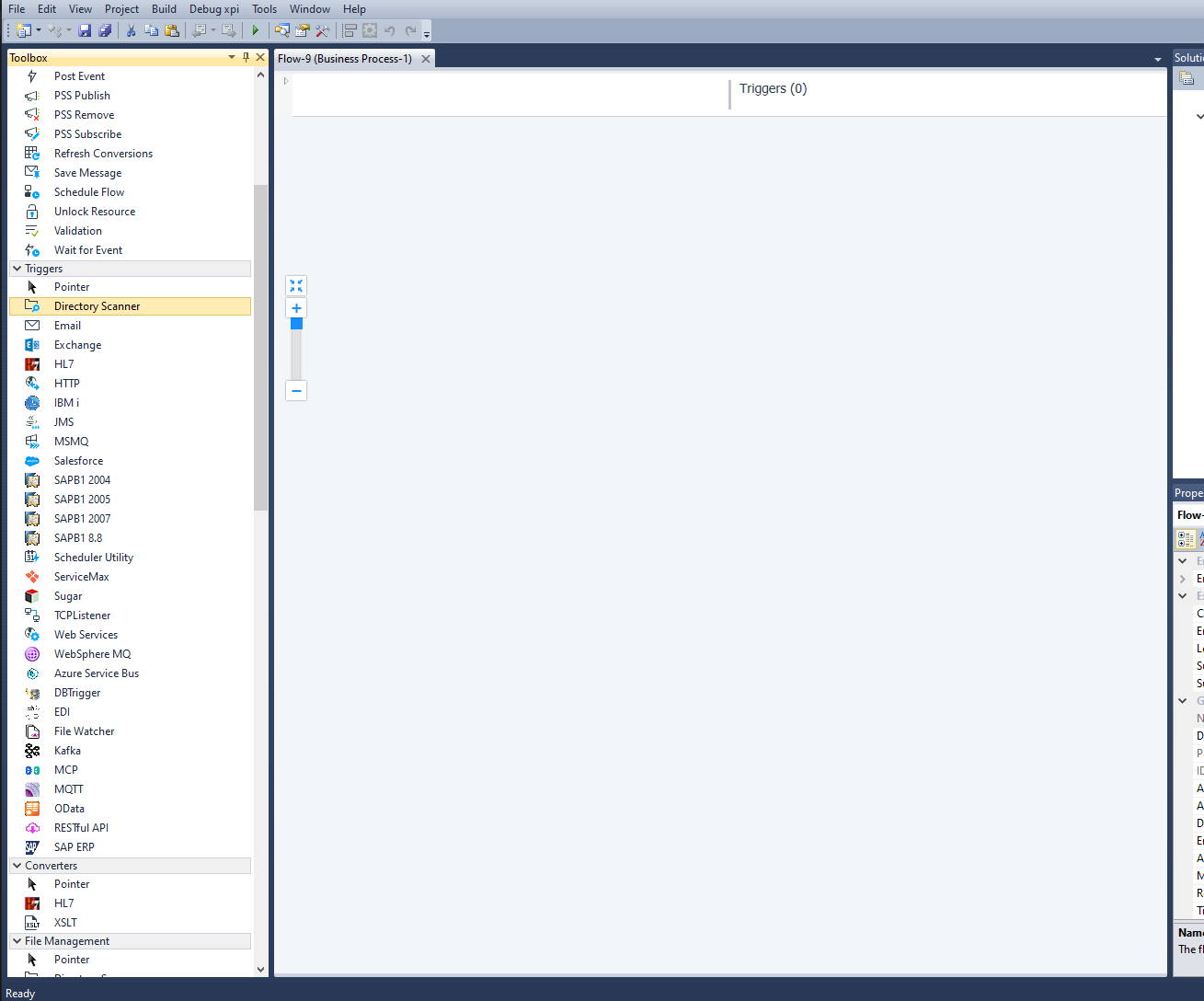 An empty flow editor with the toolbox open and Directory Scanner trigger highlighted